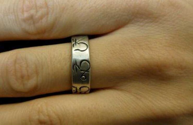 Ring als Amulett vu Gléck